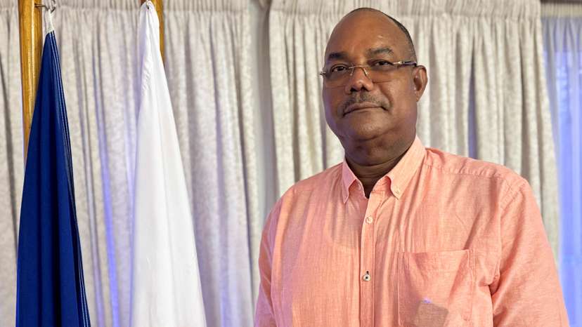 Leader of the United Seychelles (US) party Patrick Herminie poses for a photograph after a Reuters interview ahead of the upcoming general elections in Victoria, Seychelles