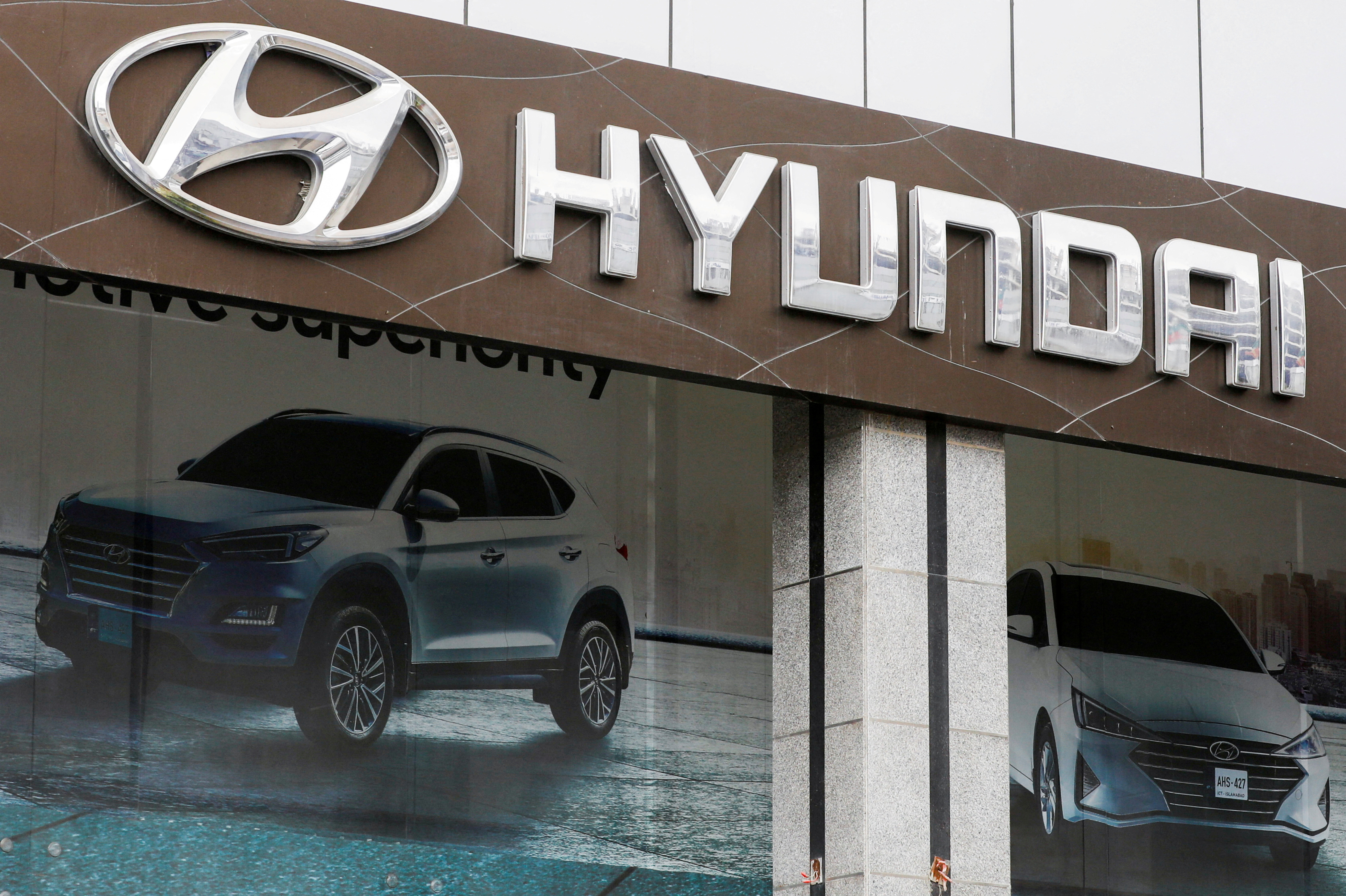 FILE PHOTO: Hyundai logo is seen at a Hyundai City Store, a company operated outlet, in Karachi