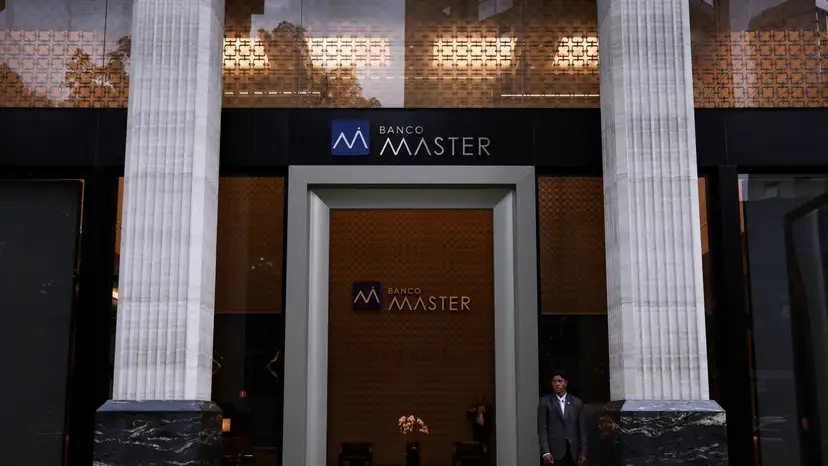 A security guard stands outside Bank Master (Banco Master), following the arrest of the controlling shareholder of lender Banco Master, businessman Daniel Vorcaro, in Sao Paulo