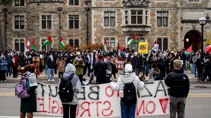 Protest in front of the residence of the University of Michigan's president in Ann Arbor