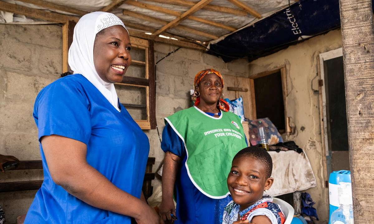 A girl reacts after receiving the HPV vaccine in Lagos State