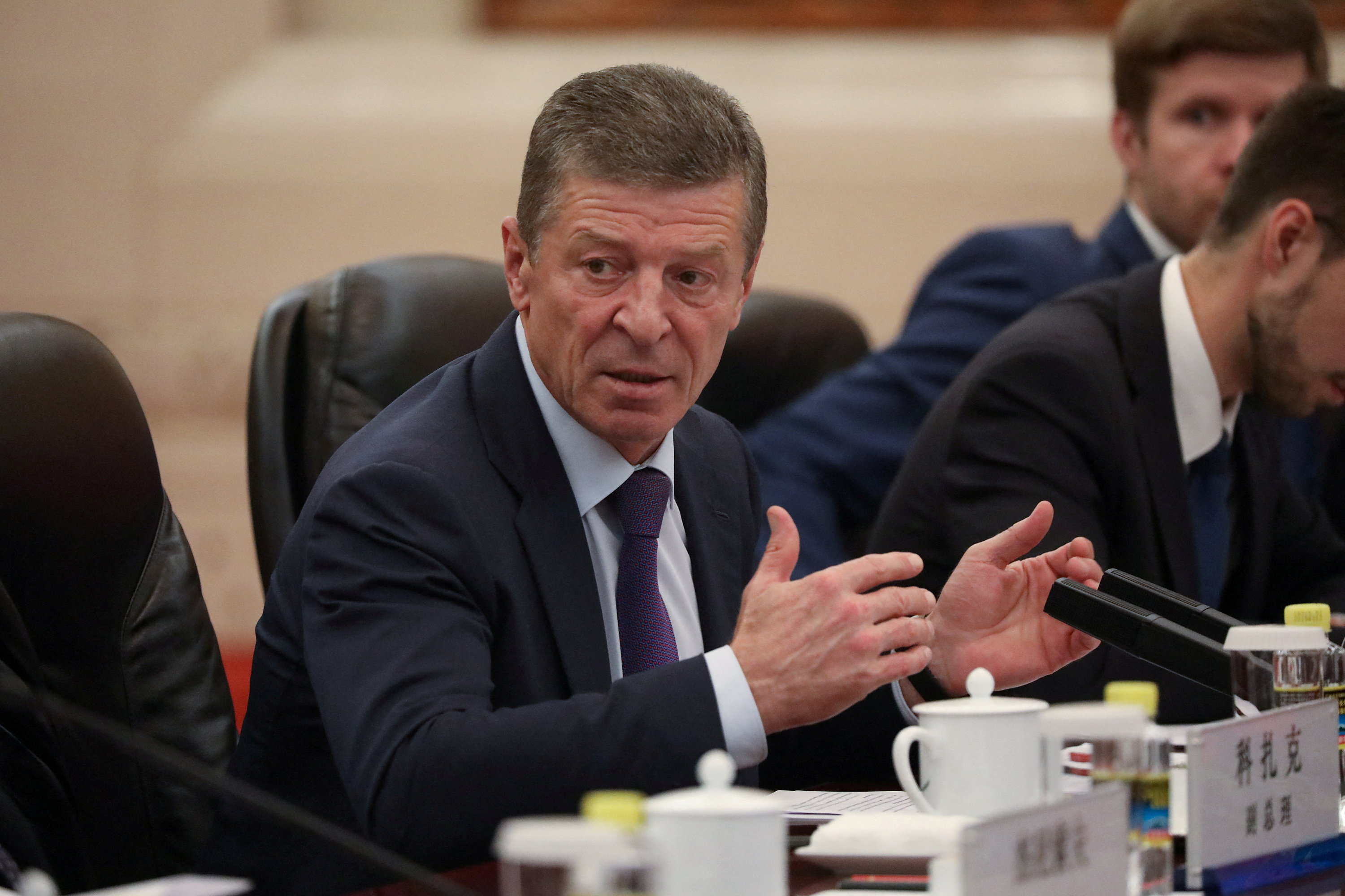 FILE PHOTO: Member of the Standing Committee of the Communist Party of China Han Zheng meets with Deputy Prime Minister of Russia Dmitry Kozak in Beijing