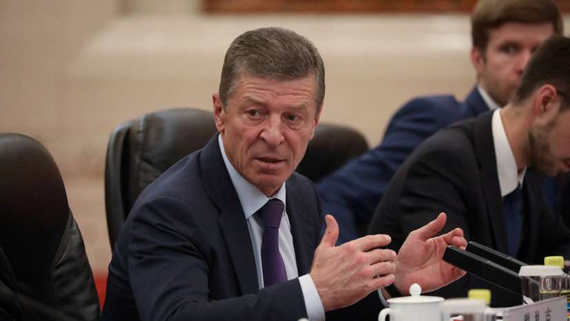 FILE PHOTO: Member of the Standing Committee of the Communist Party of China Han Zheng meets with Deputy Prime Minister of Russia Dmitry Kozak in Beijing