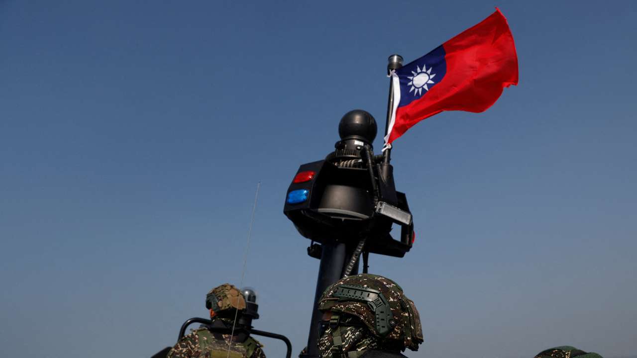 FILE PHOTO: Members of Taiwan's Navy in a drill part of a demonstration for the media at a navy base in Kaohsiung