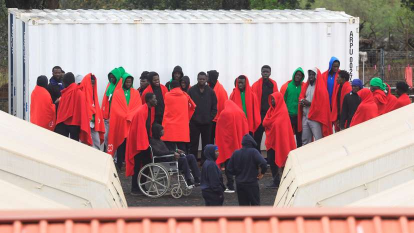 Migrants gather at the CATE (temporary assistance center for foreigners) in San Andres on the island of El Hierro