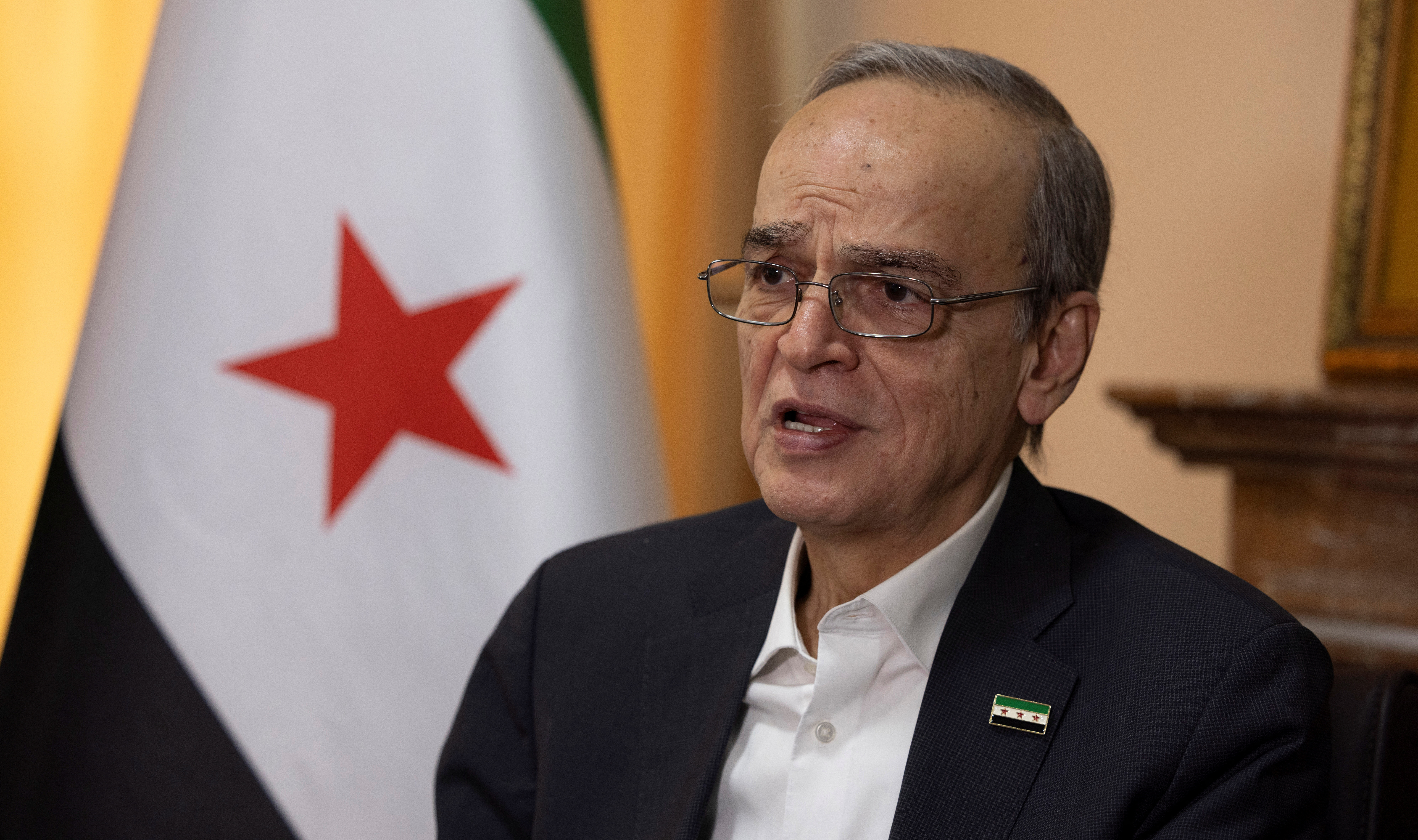 Hadi Al Bahra, president of the National Coalition of Syrian Revolution and Opposition Forces, speaks during an interview with Reuters in Istanbul