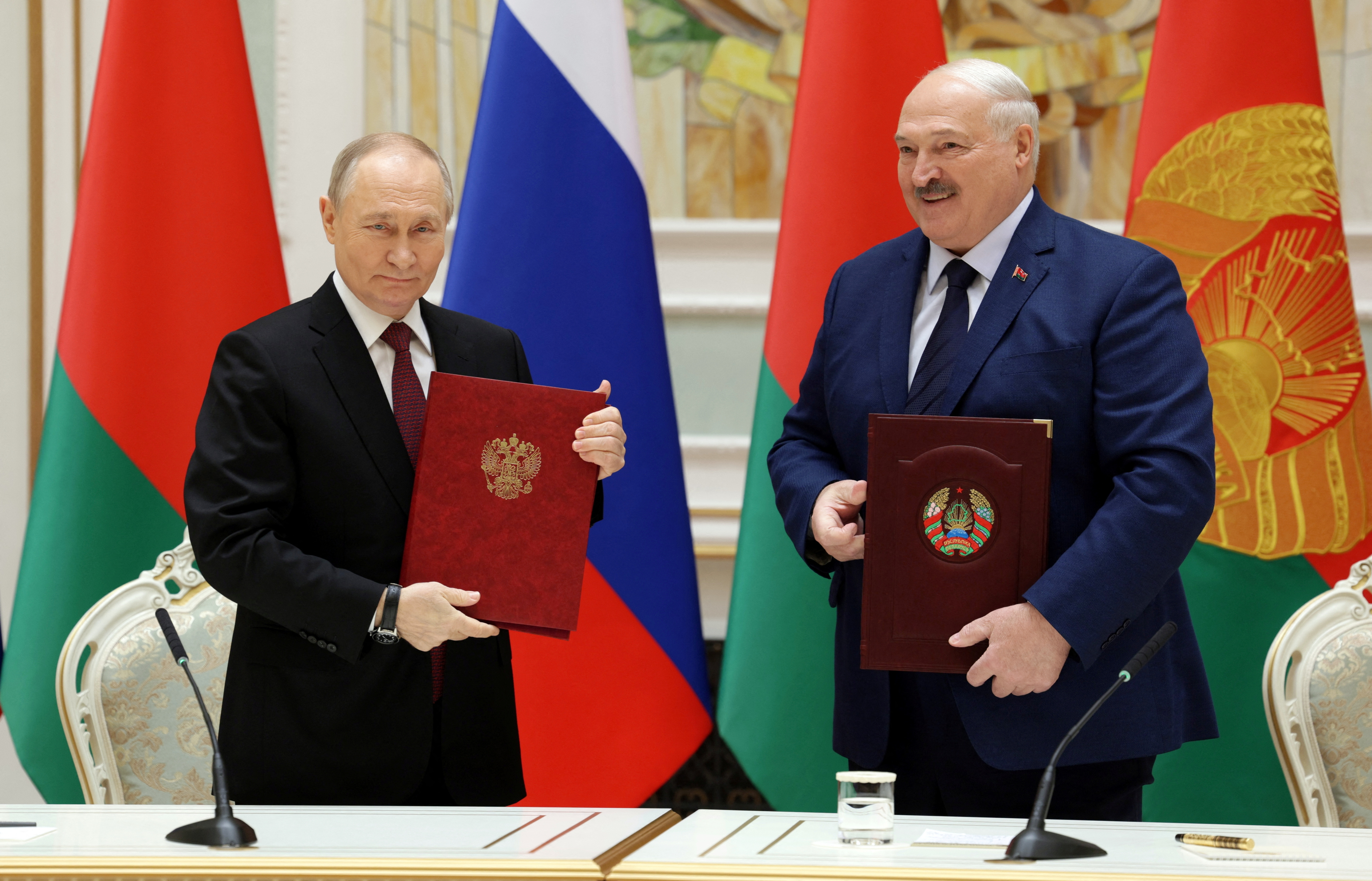 Russia's President Putin and Belarus' President Lukashenko chair Union State summit in Minsk