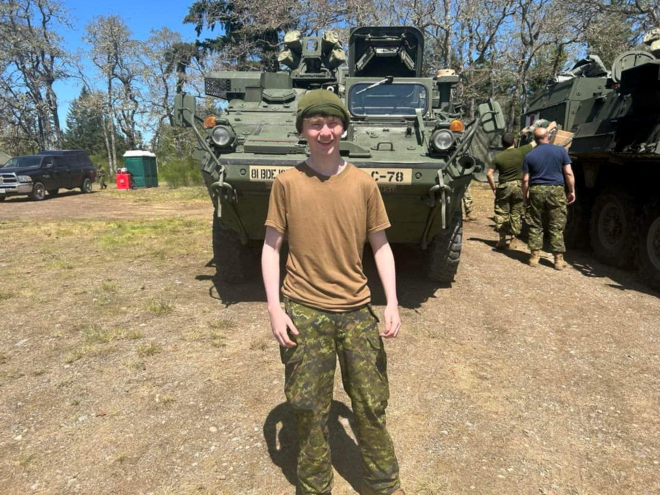 An undated handout photo of Canadian teenager Laken Pavan standing by a military vehicle.