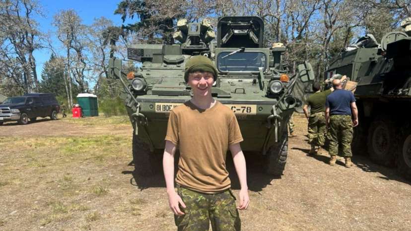 An undated handout photo of Canadian teenager Laken Pavan standing by a military vehicle.