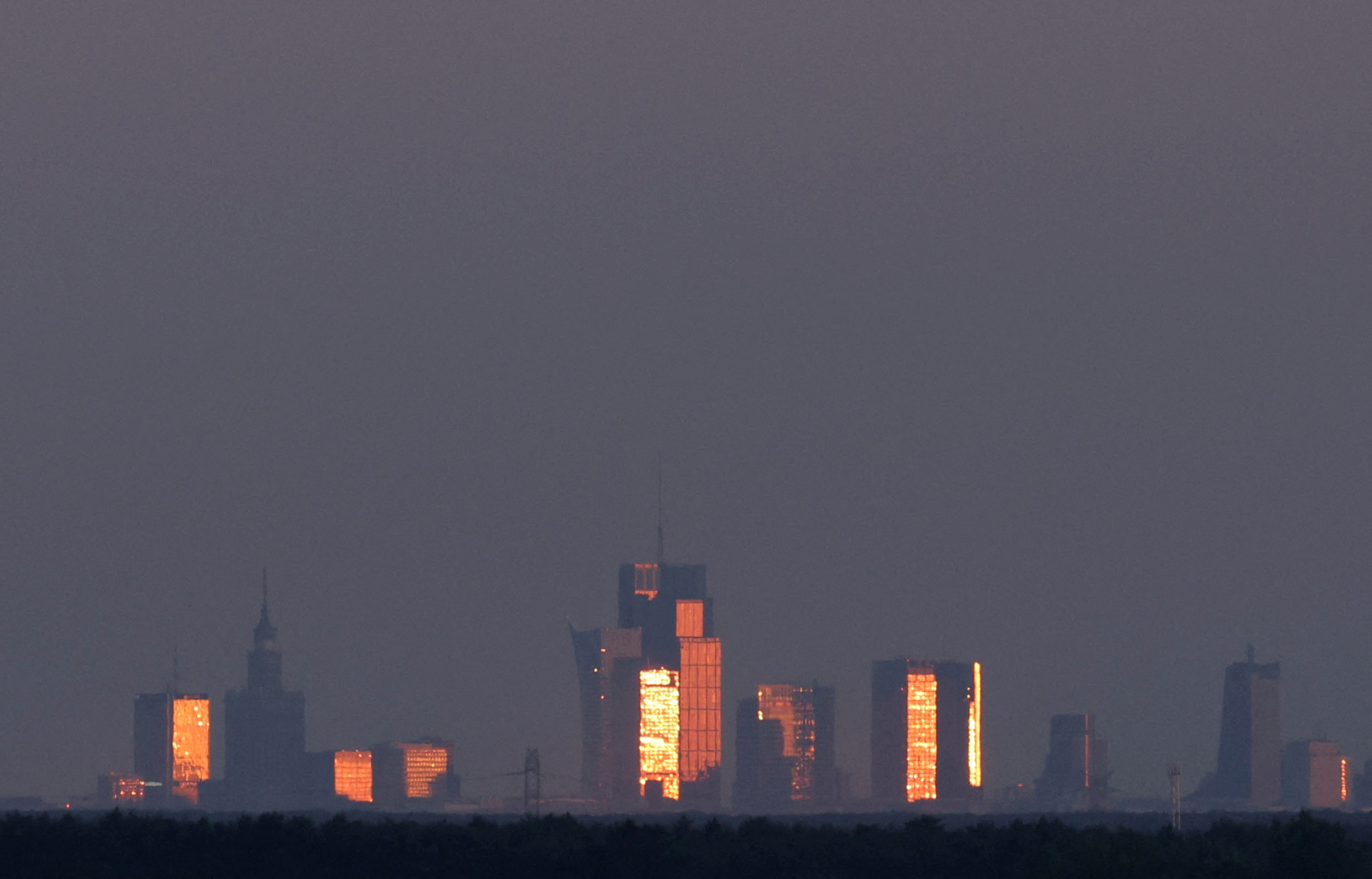 FILE PHOTO: A general view of Warsaw skyscrapers is seen from the  field near Popowo Koscielne