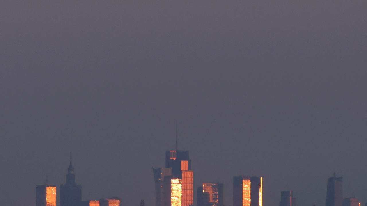 FILE PHOTO: A general view of Warsaw skyscrapers is seen from the field near Popowo Koscielne