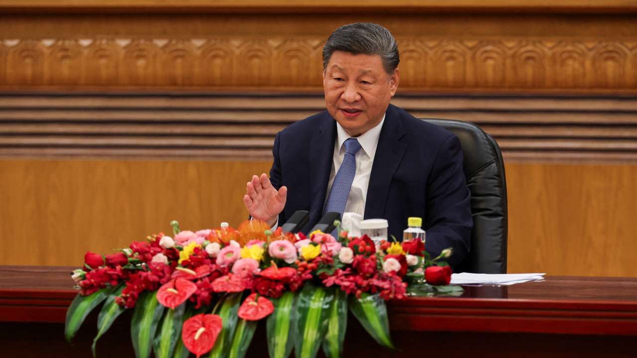Chinese President Xi Jinping attends a meeting with foreign business leaders at the Great Hall of the People in Beijing