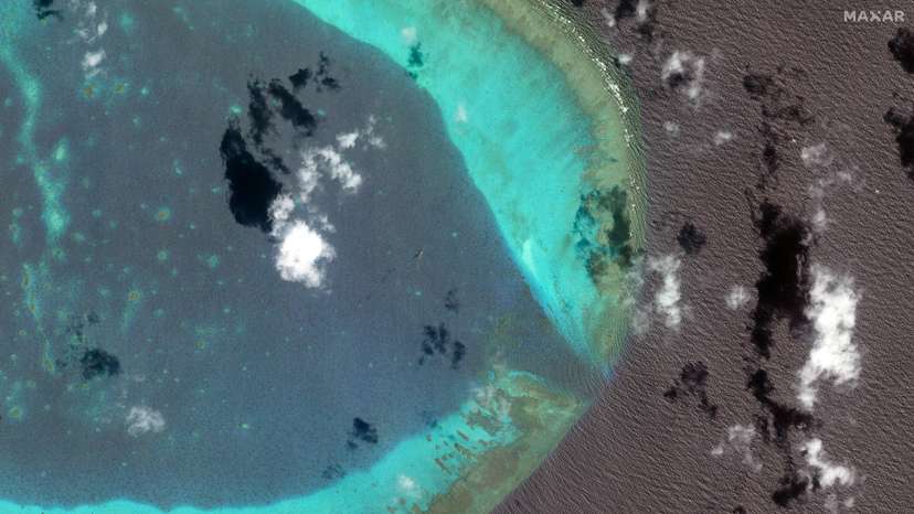 FILE PHOTO: Chinese H-6 bombers fly at the eastern edge of the disputed Scarborough Shoal in the South China Sea