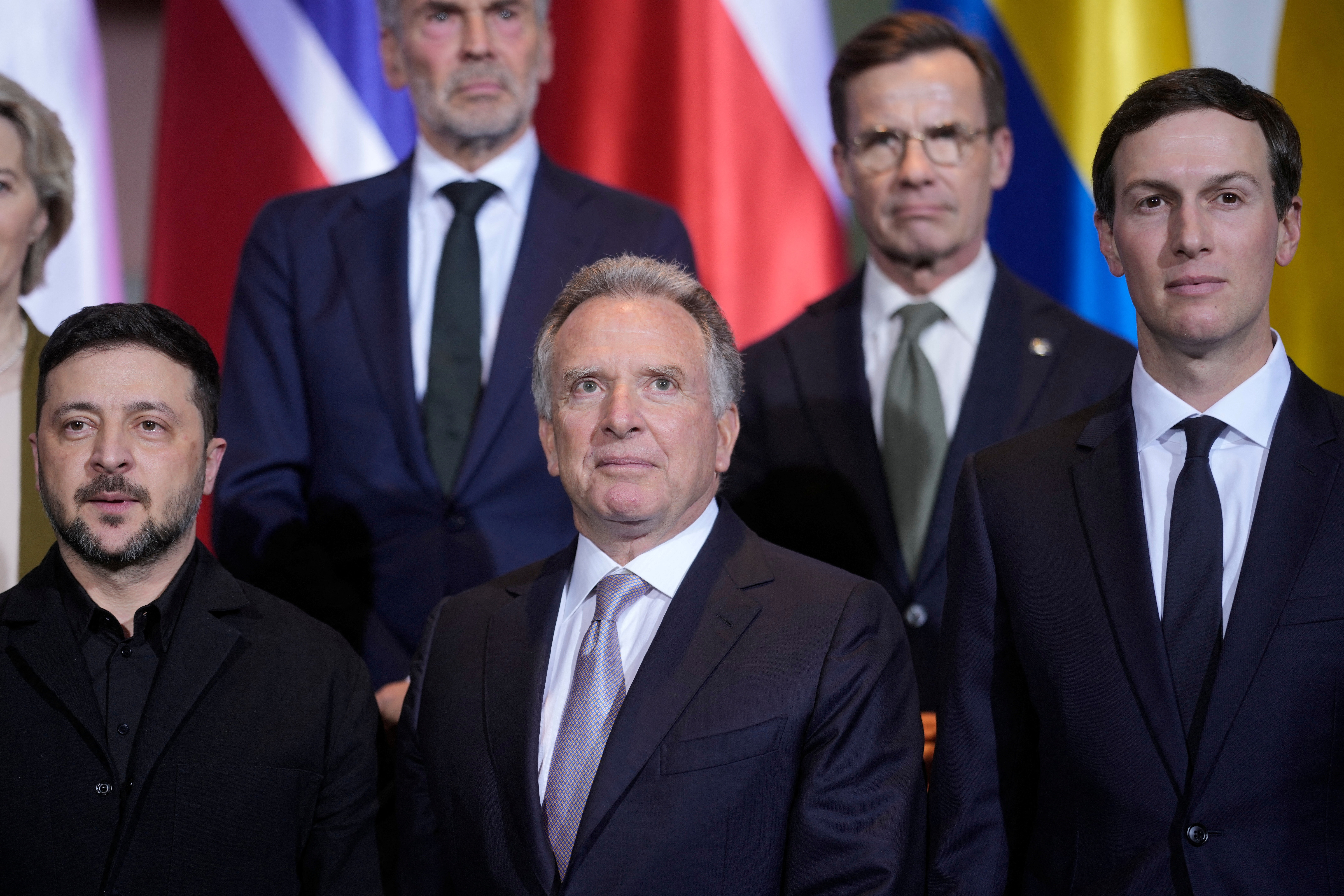 Ukraine's President Volodymyr Zelenskiy, Steve Witkoff, special envoy of the United States, and Jared Kushner stand together at the Chancellery in Berlin