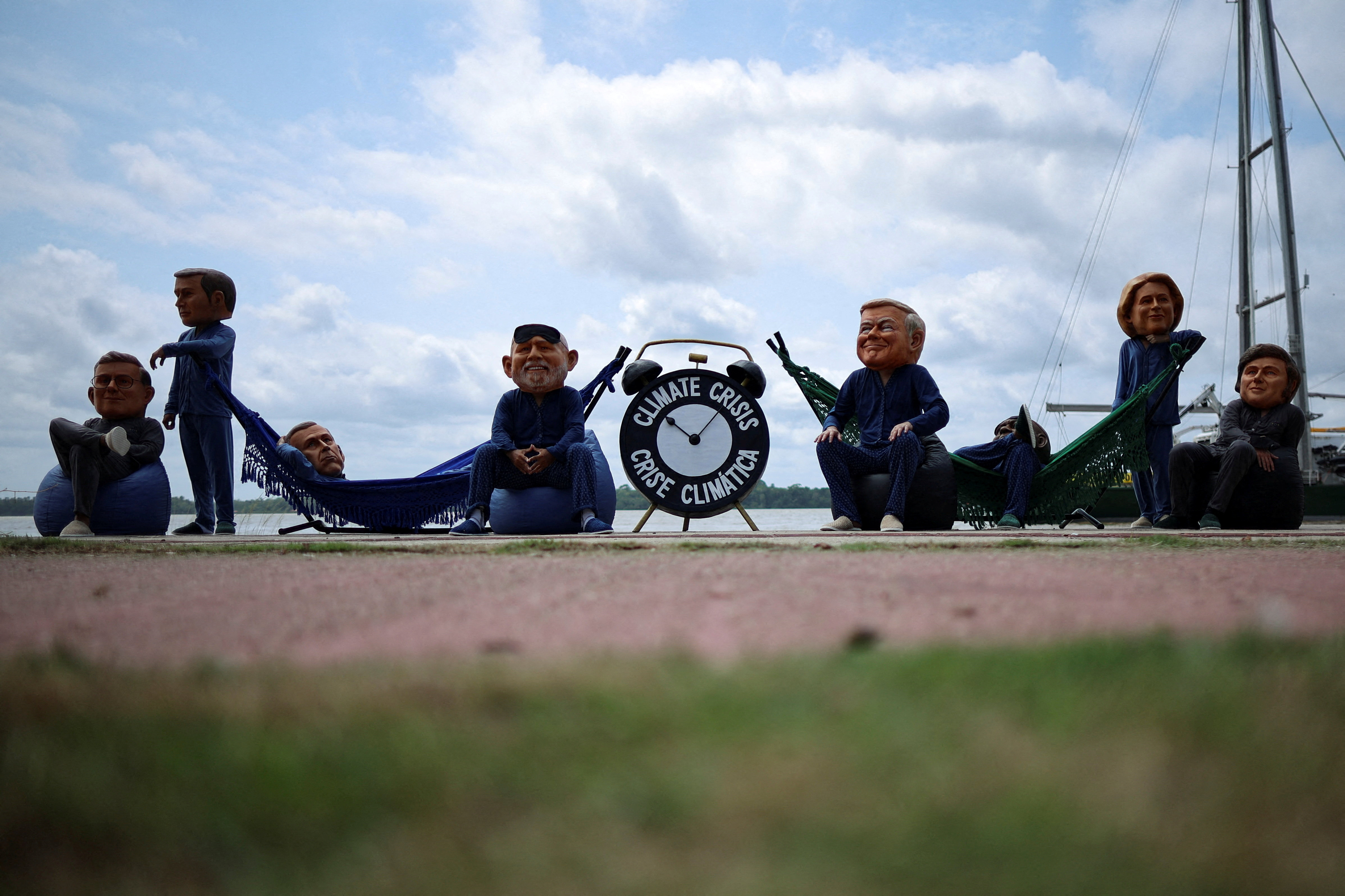 FILE PHOTO: Oxfam activists stage protest ahead of COP30 summit, in Belem