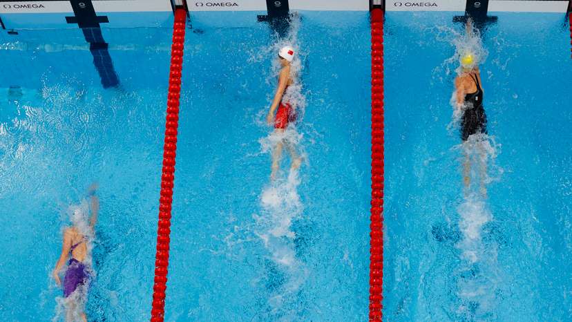 FILE PHOTO: Swimming - Mixed 4 x 100m Medley Relay - Heats