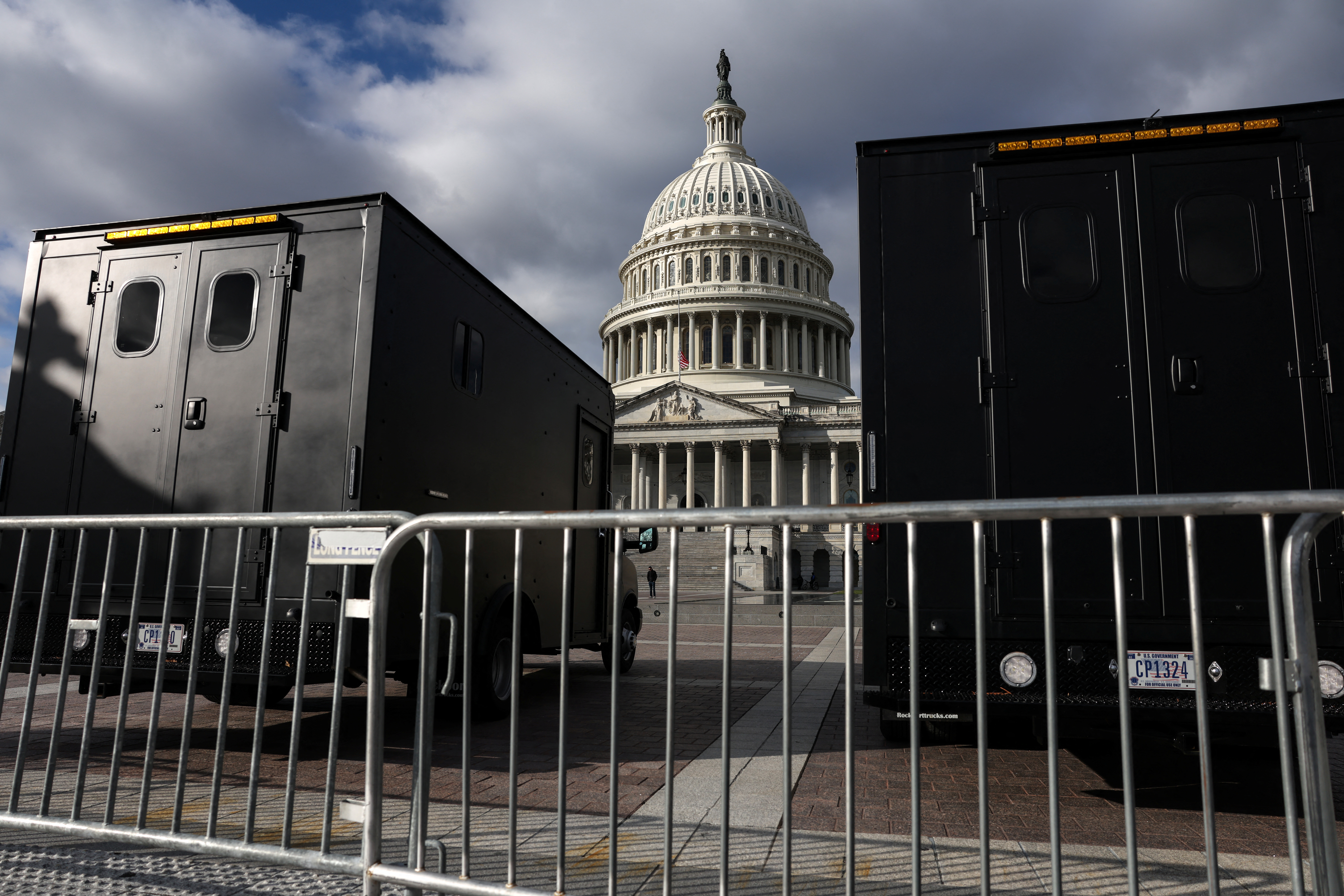 Police vehicles are parked outside the US Capitol building in Washington