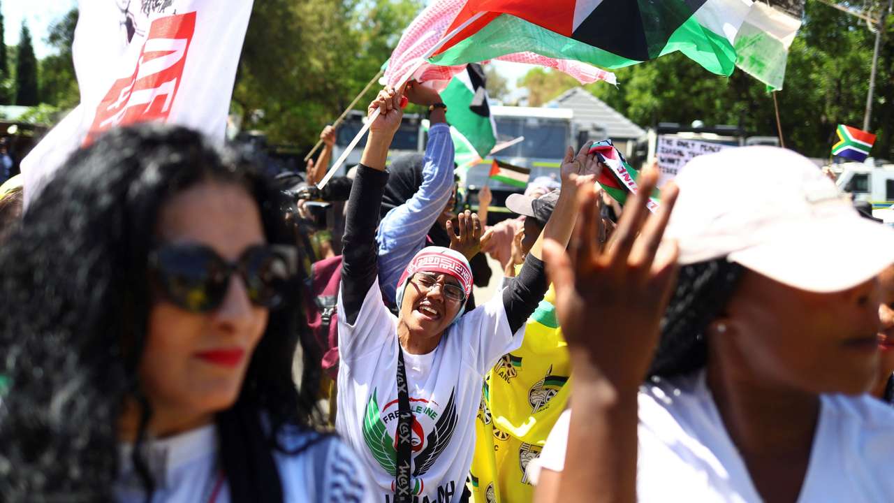 Demonstrators gather outside the Israeli embassy in Pretoria
