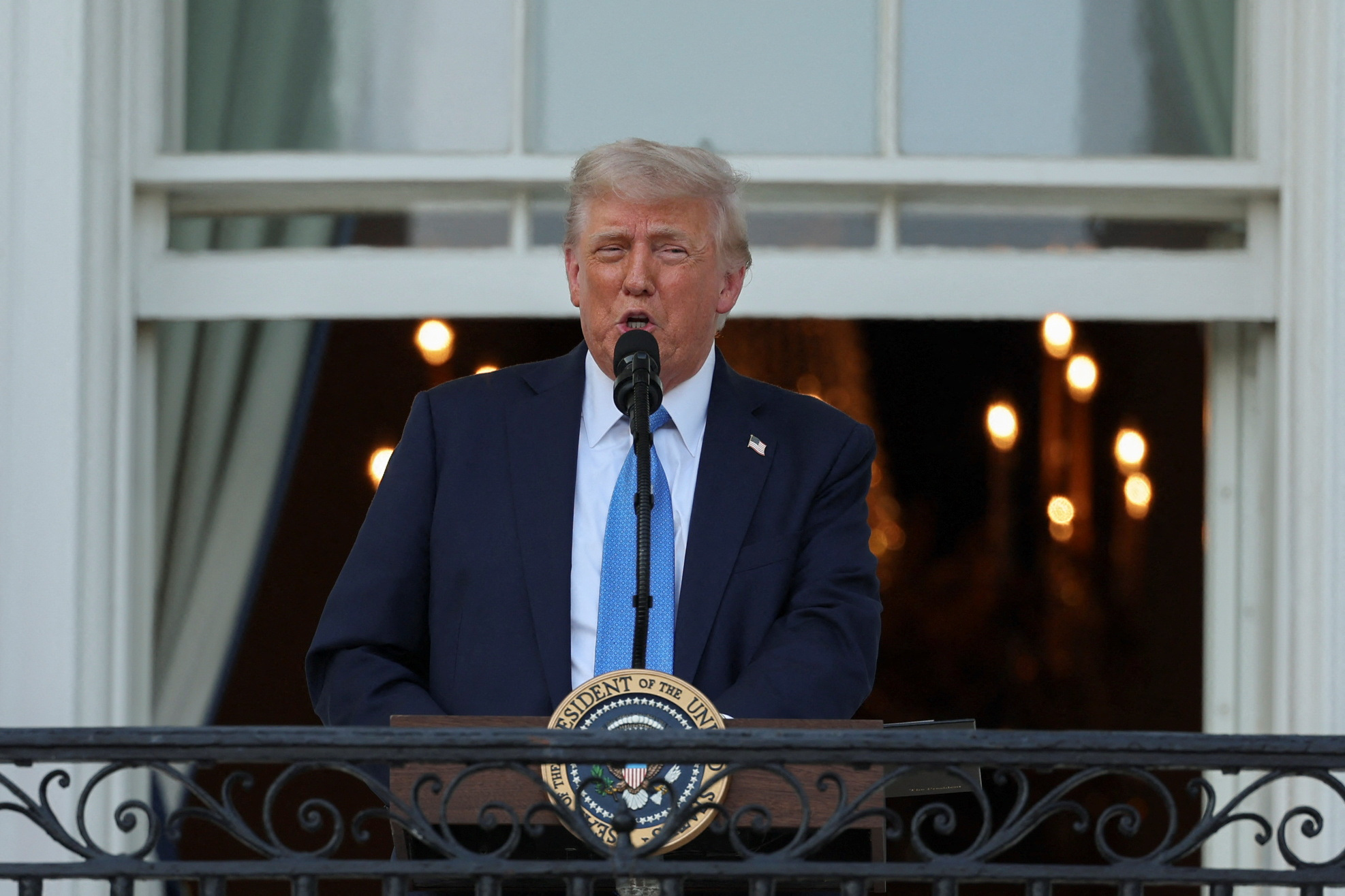 U.S. President Donald Trump attends a "Summer Soiree" held on the South Lawn of the White House in Washington
