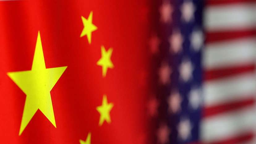 FILE PHOTO: Illustration shows U.S. and Chinese flags