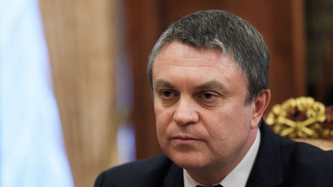 FILE PHOTO: Russian President Vladimir Putin meets with Leonid Pasechnik, Moscow-installed acting leader of the Russian-controlled parts of Ukraine's Luhansk region, at the Kremlin in Moscow