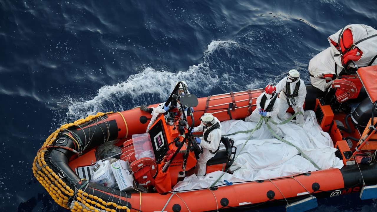 Handout image shows body bags of migrants retrived from the Mediterranean sea
