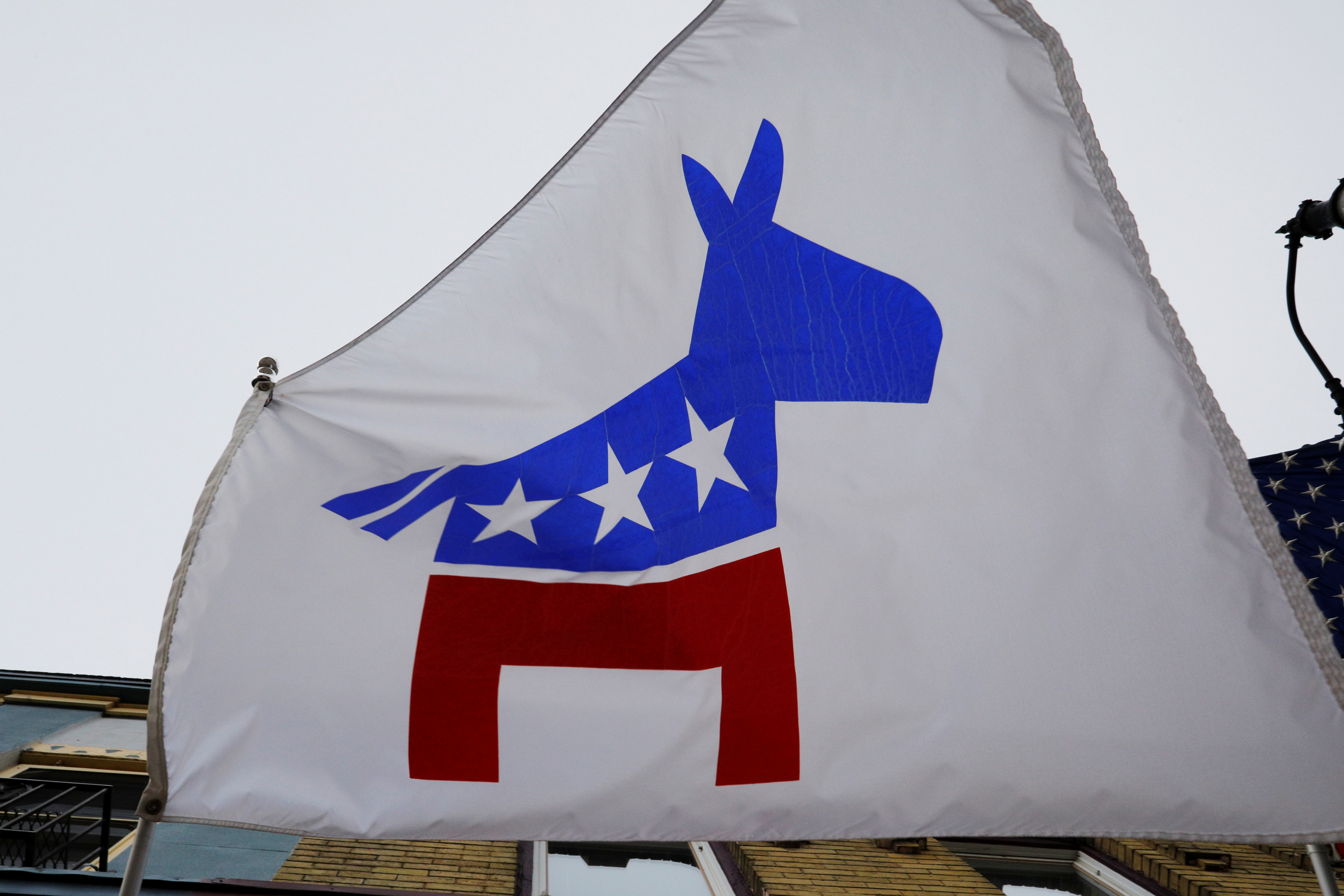 A flag with a logo of the Democratic Party flies in Racine