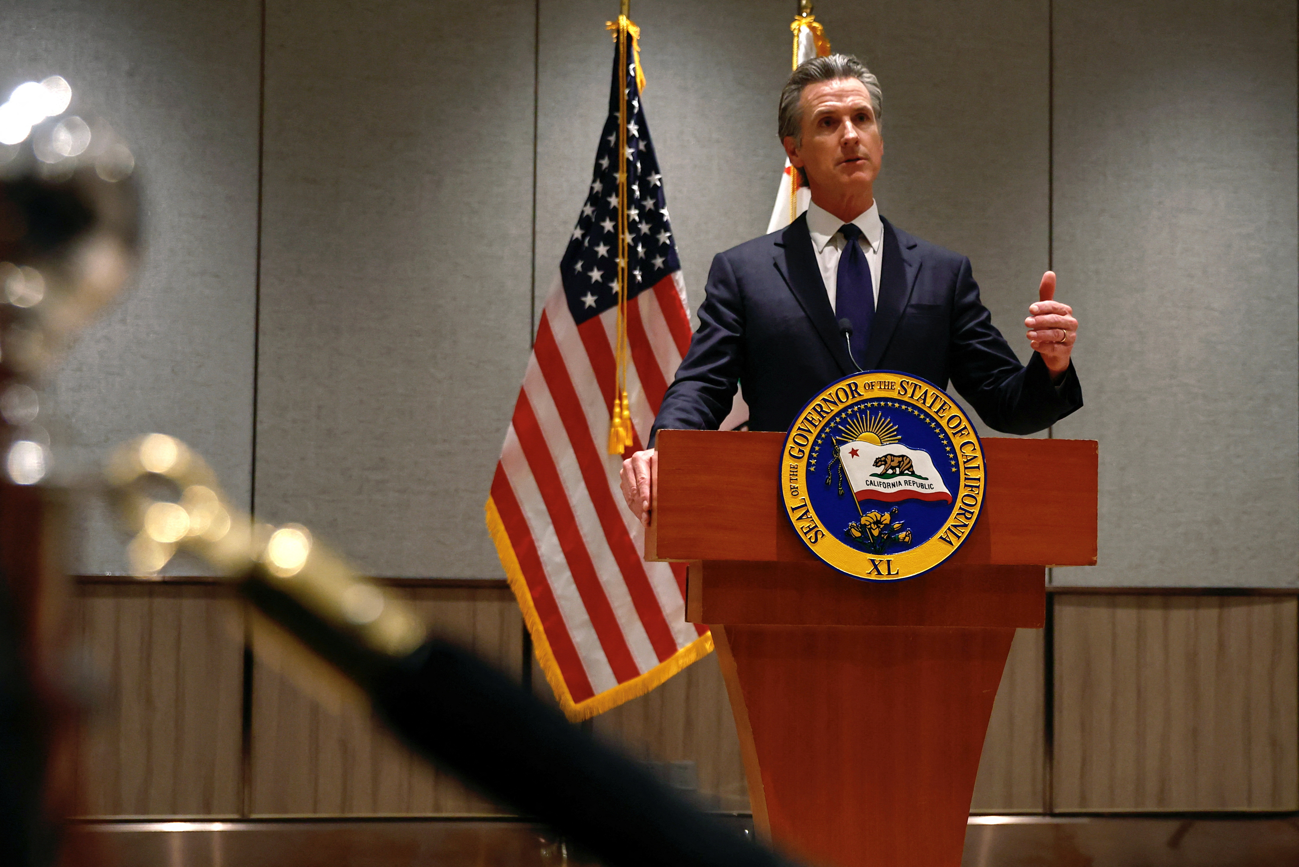Governor of U.S. state of California Gavin Newsom speaks at a press conference in Beijing