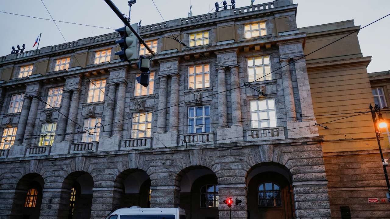 Members of the police stand guard following a shooting at one of Charles University's buildings in Prague