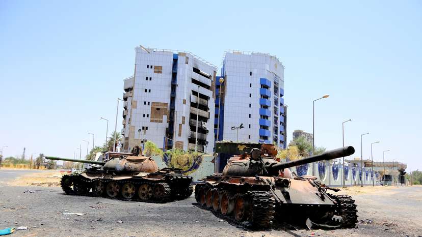 A view of damaged tanks in front of the Central Bank of Sudan building, in Khartoum