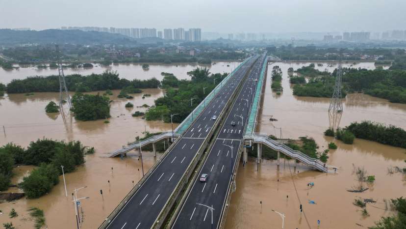 Drone view shows roads submerged in floodwaters following heavy rainfall,in Qingyuan