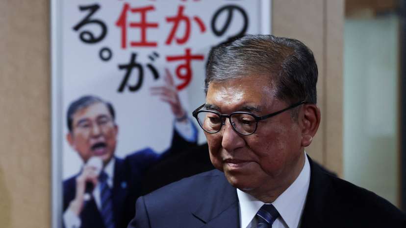 Japan's Prime Minister Ishiba speaks to media after meeting with the party's executives at the LDP headquarters in Tokyo