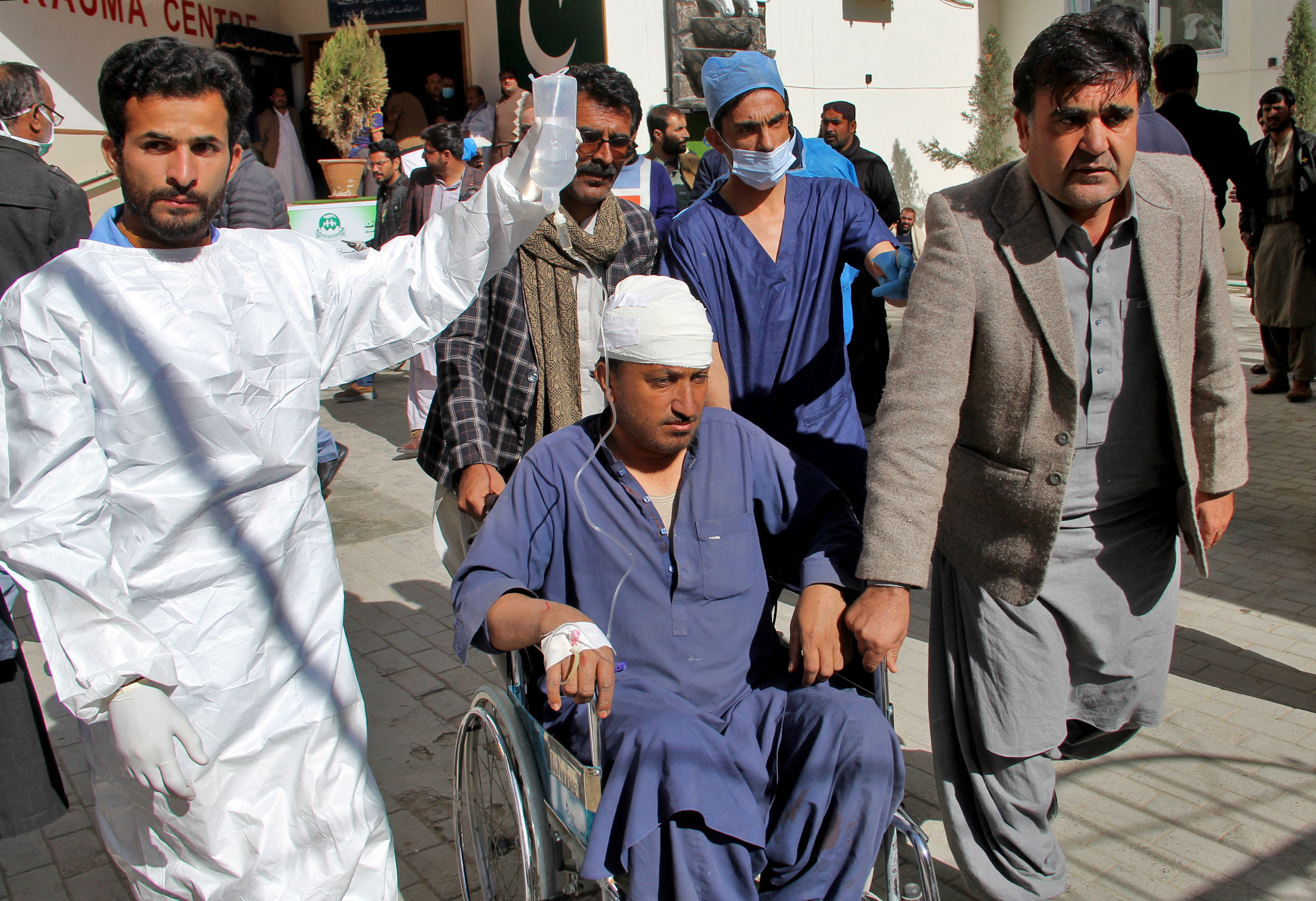 A man, who was injured in a blast in Khanozai, leaves hospital after receiving treatment in Quetta