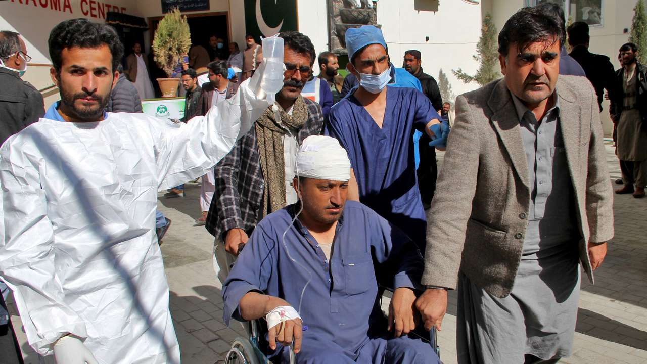 A man, who was injured in a blast in Khanozai, leaves hospital after receiving treatment in Quetta