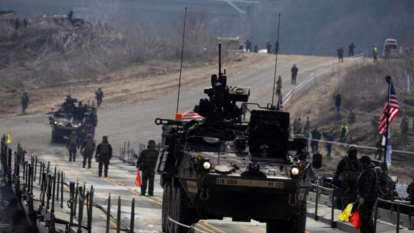 FILE PHOTO: South Korean and US soldiers conduct a joint river-crossing exercise in Yeoncheon
