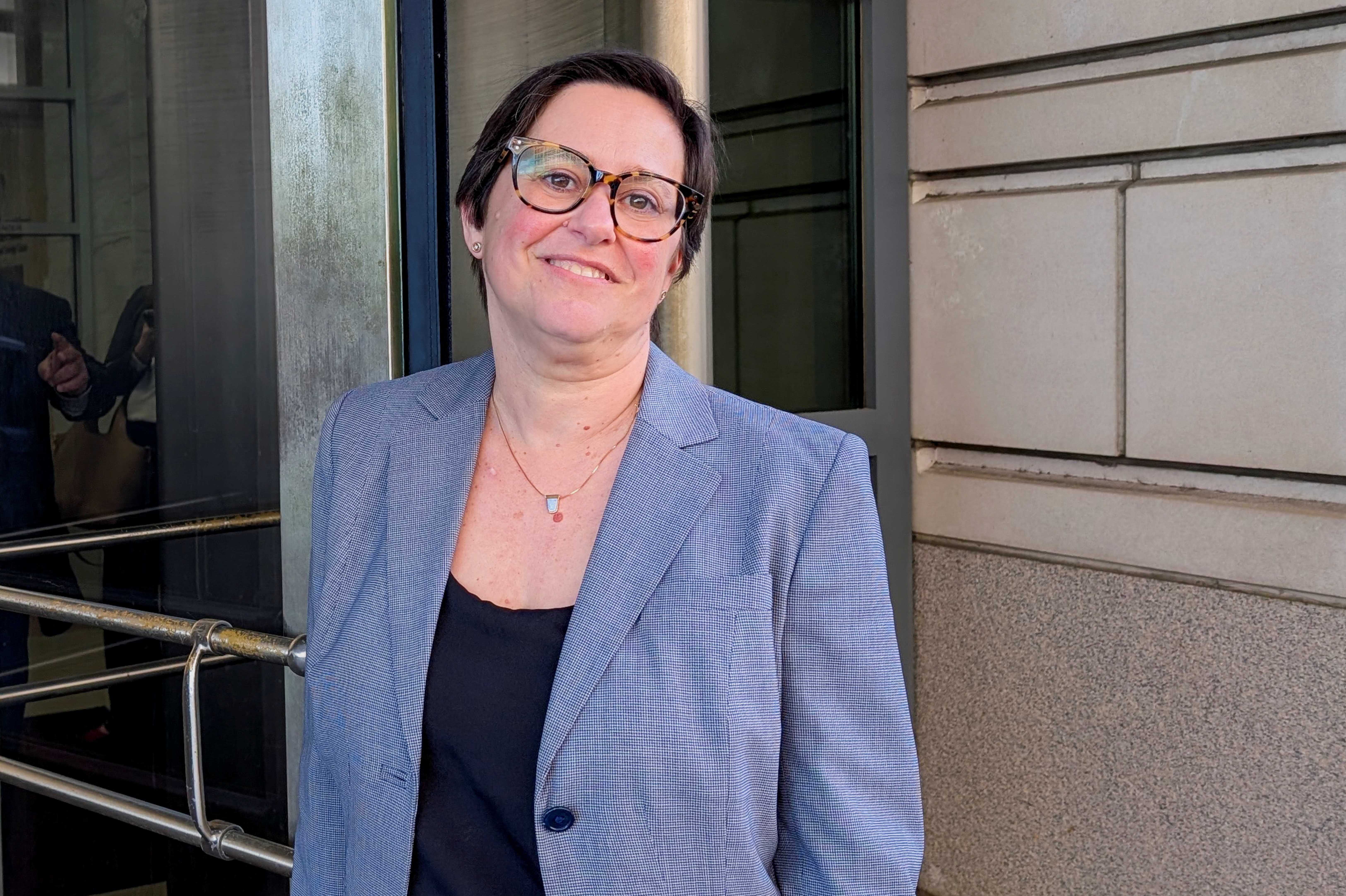 Cathy Harris of the U.S. Merit Systems Protection Board leaves the E. Barrett Prettyman U.S. Courthouse in downtown Washington, D.C.