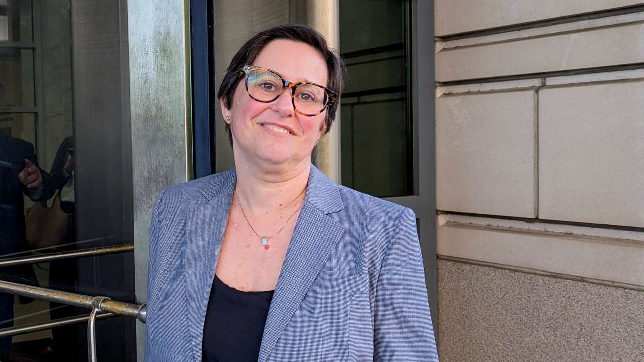 Cathy Harris of the U.S. Merit Systems Protection Board leaves the E. Barrett Prettyman U.S. Courthouse in downtown Washington, D.C.