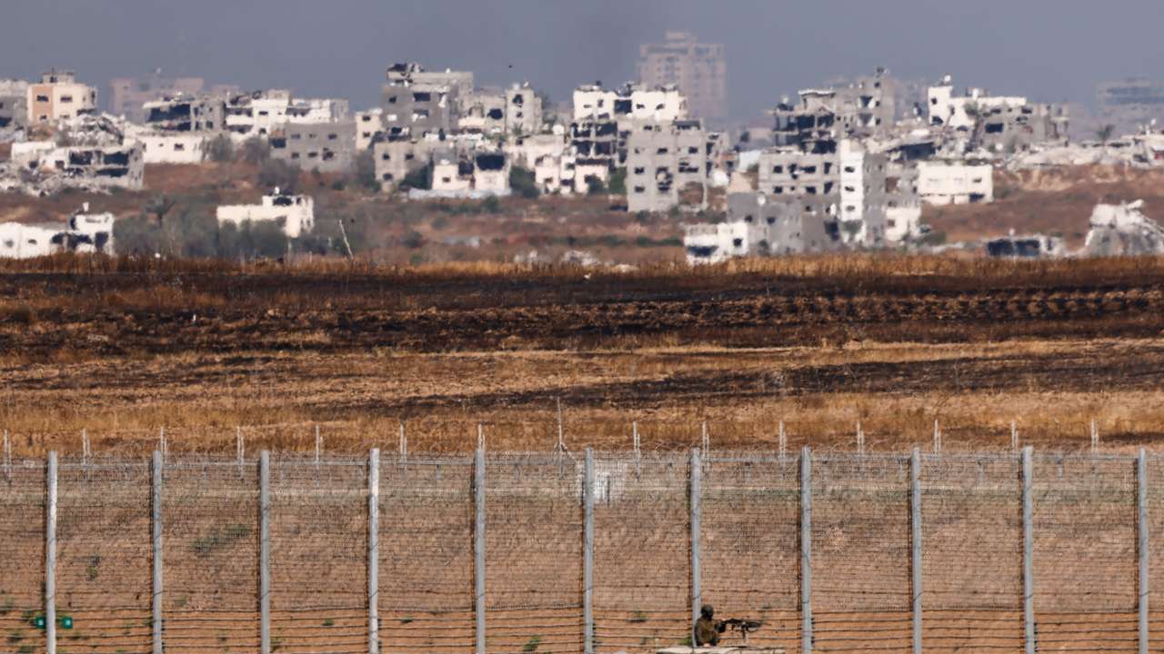 An Israeli military vehicle patrols on the Israeli side of the Gaza border