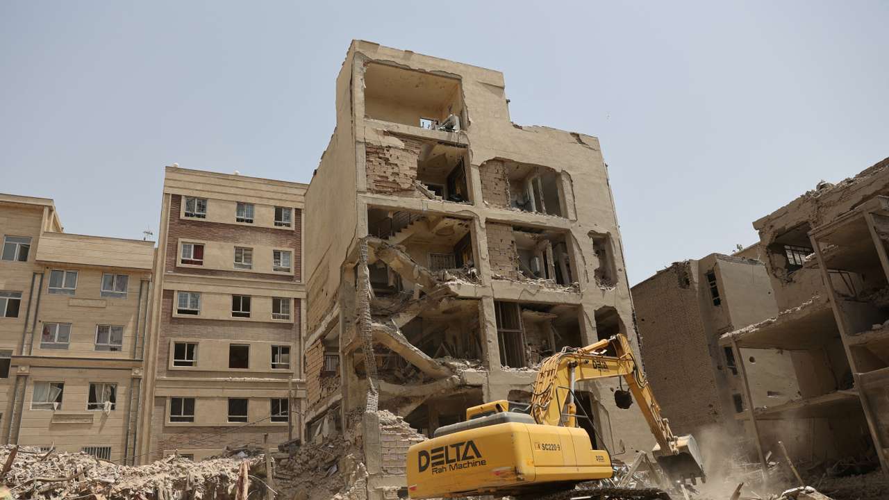 FILE PHOTO: A view shows the aftermath of an Israeli strike on a building on Monday, after the ceasefire between Israel and Iran, in Tehran