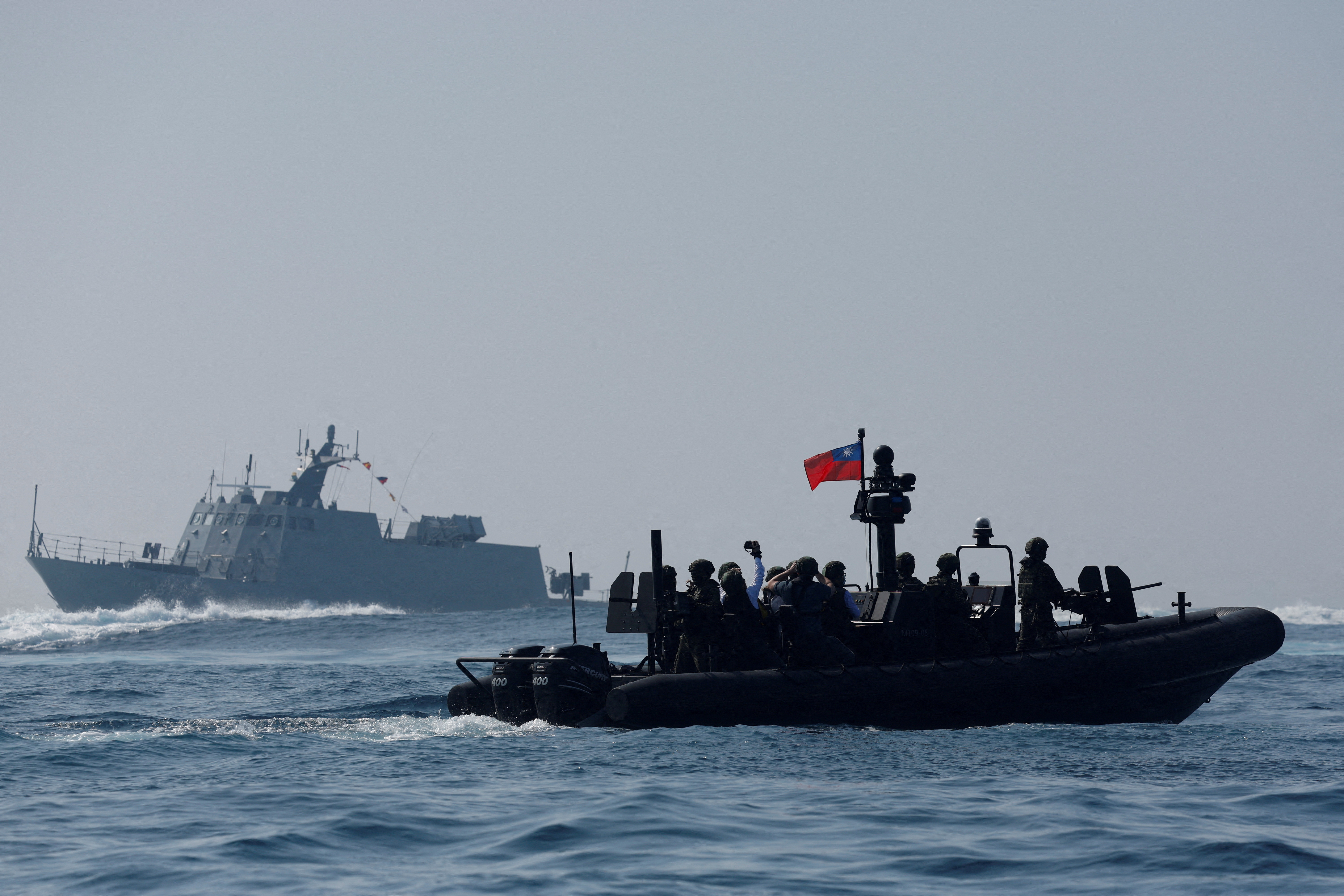 FILE PHOTO: Members of Taiwan's Navy in a drill part of a demonstration for the media at a navy base in Kaohsiung