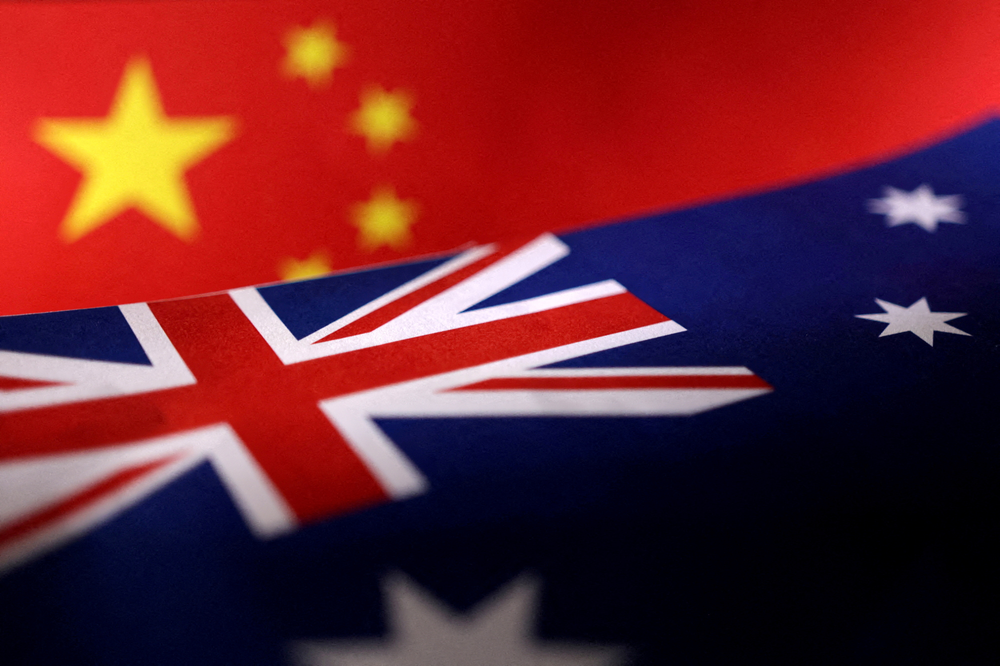 FILE PHOTO: FILE PHOTO: Illustration shows printed Chinese and Australian flags