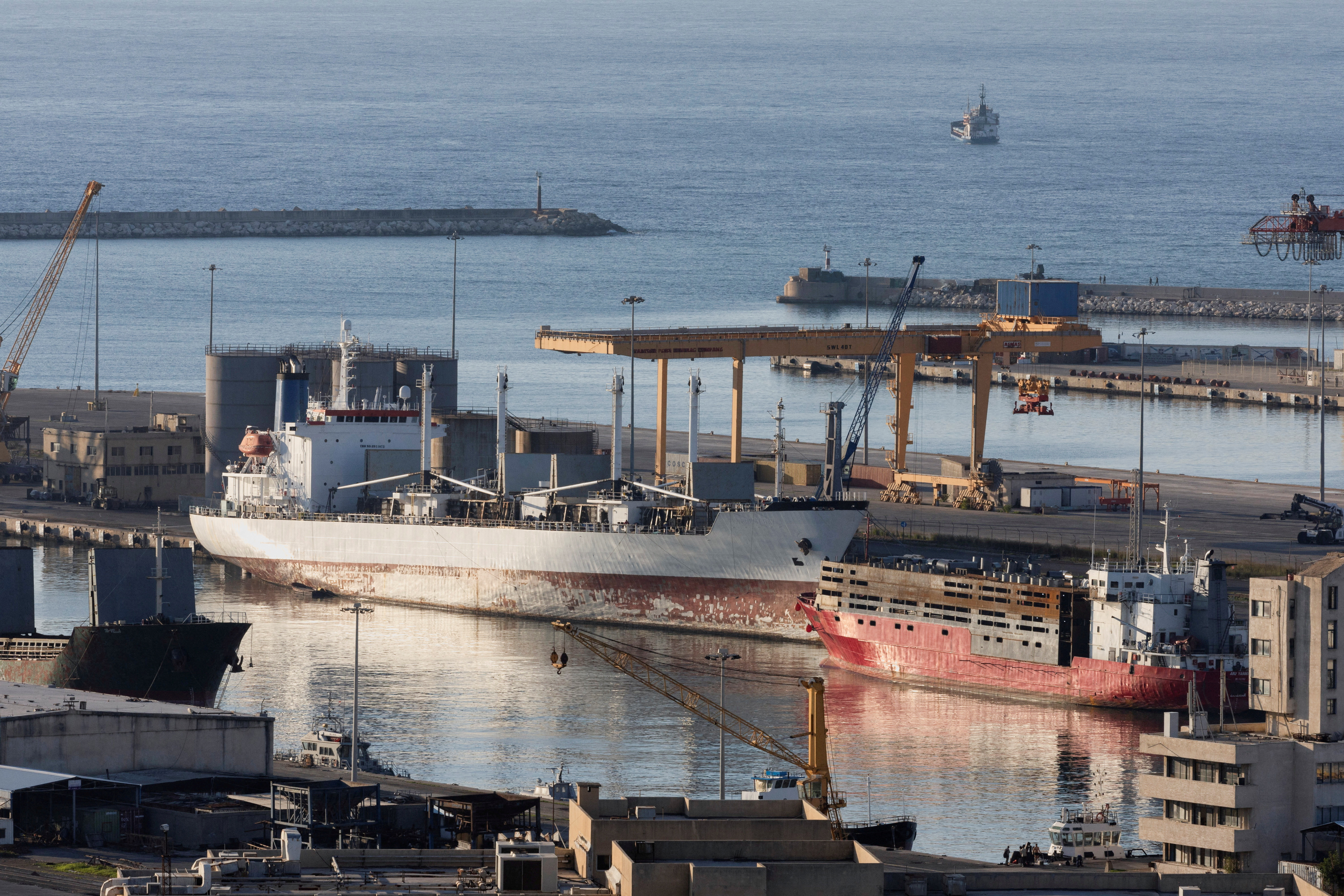 FILE PHOTO: A general view of commercial harbour of Syria's coastal city of Tartous