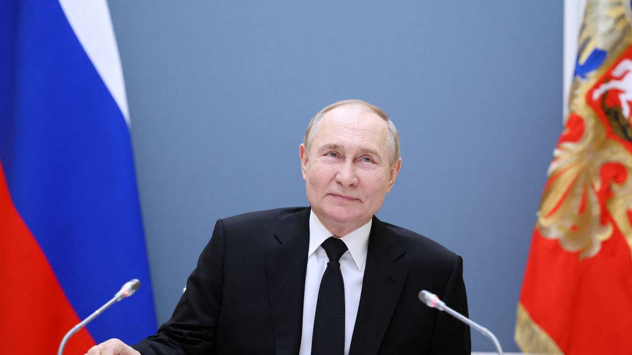 FILE PHOTO: Russian President Putin holds a meeting with large families from various Russia's regions via video link in Moscow