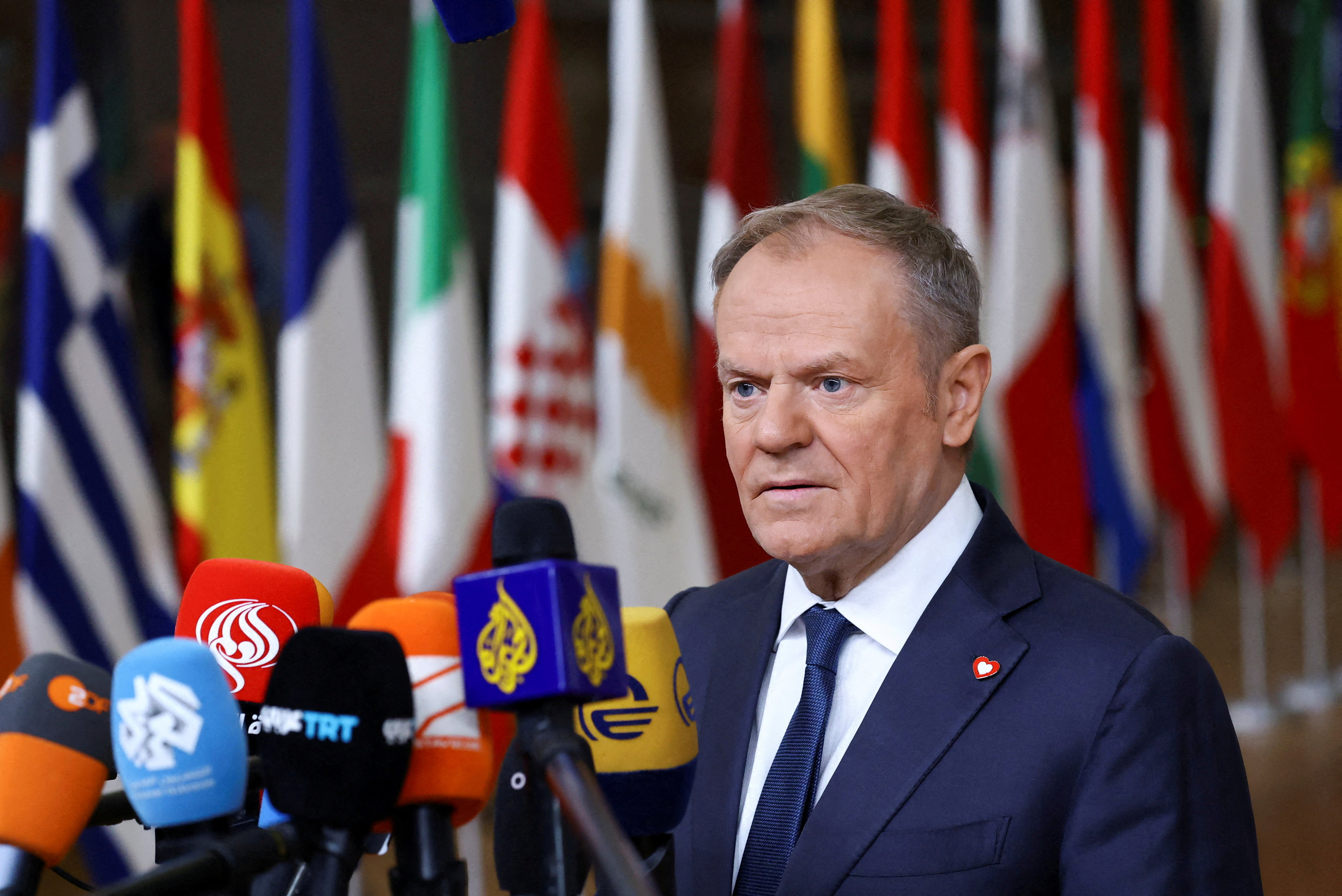 FILE PHOTO: Polish Prime Minister Tusk speaks to the media during a European Union summit in Brussels