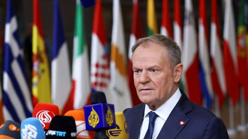 FILE PHOTO: Polish Prime Minister Tusk speaks to the media during a European Union summit in Brussels
