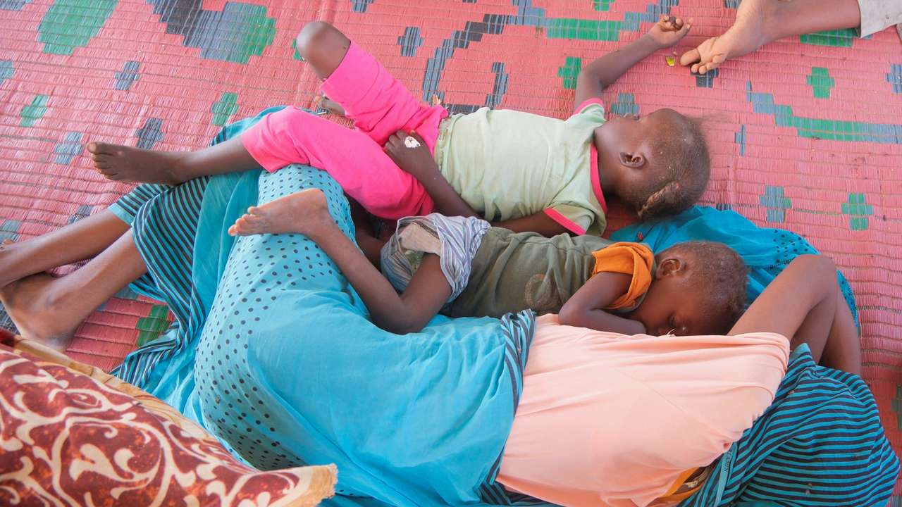 Displaced Sudanese girls who fled intense fighting in al-Fashir playing at a displacement camp in Al Dabba