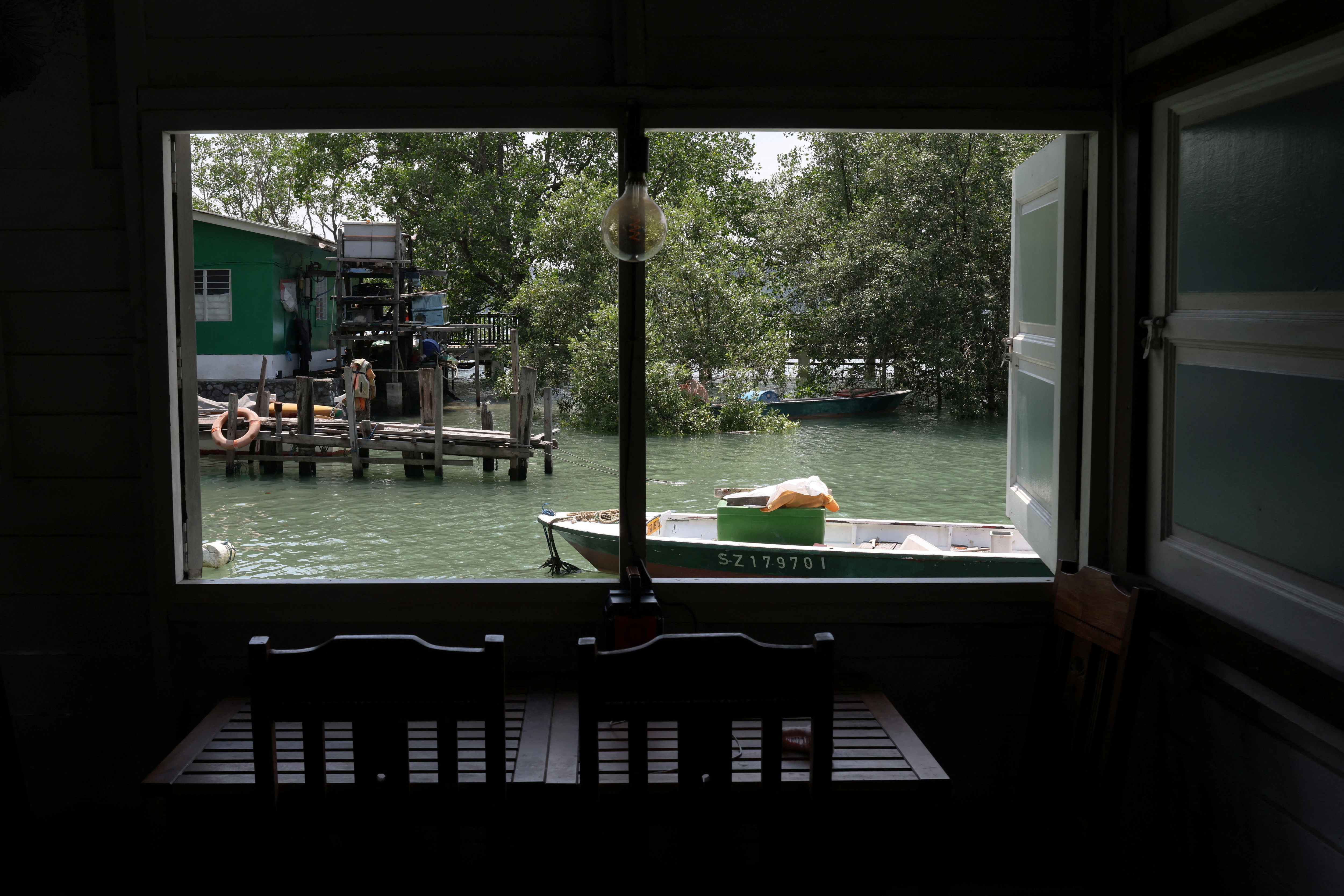 A view from the living room of a wooden stilt house on Singapore’s Pulau Ubin island