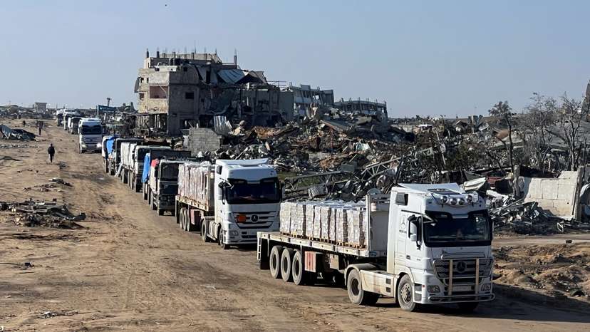Trucks carrying aid move, amid a ceasefire between Israel and Hamas, in Rafah in the southern Gaza Strip