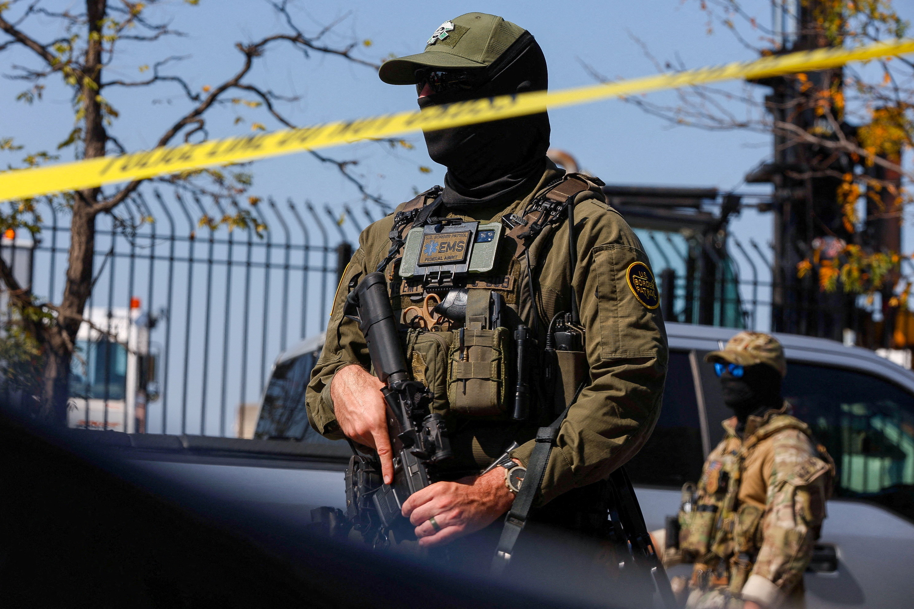 FILE PHOTO: People protest during a standoff with ICE and federal officers in Chicago
