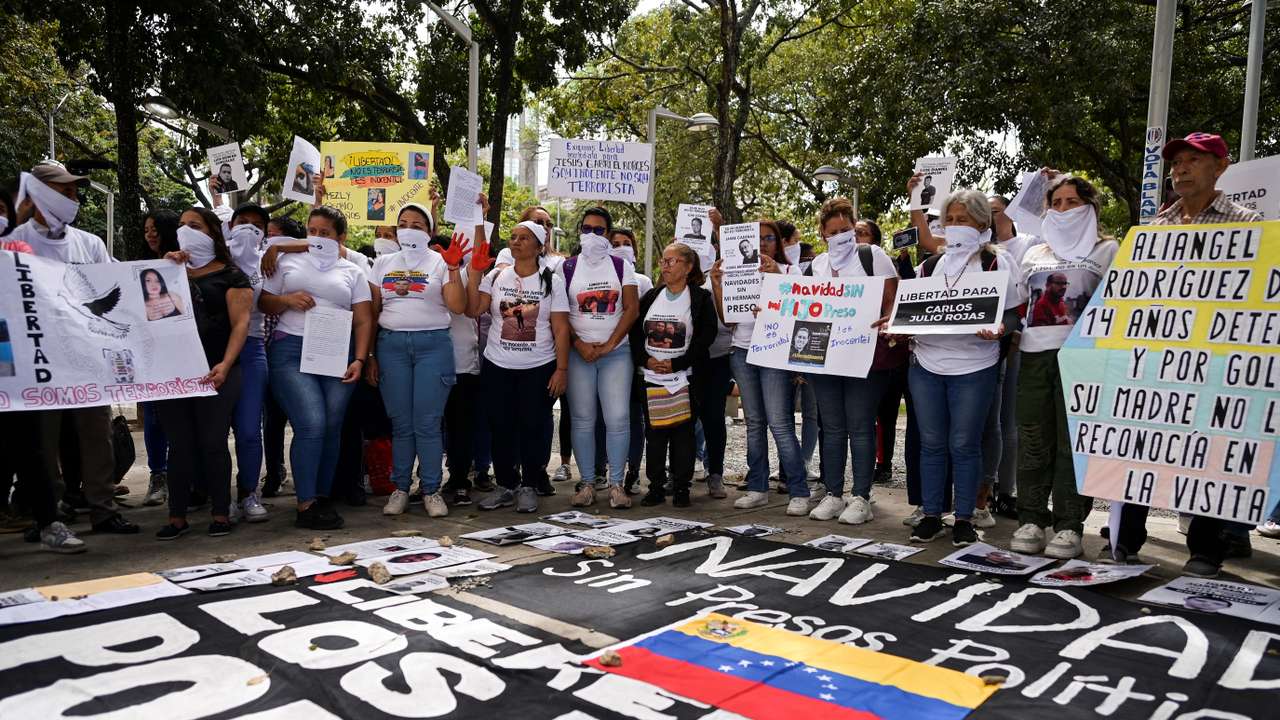 Relatives of detained Venezuelans protest outside the public prosecutor’s headquarters, in Caracas